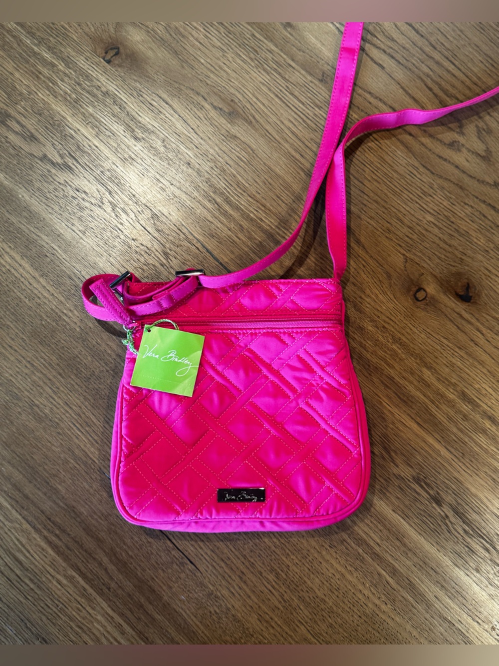 Vera Bradley NWT Crossbody Hipster in fuchsia pink is a stylish and trendy